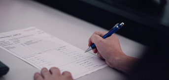 person writing notes